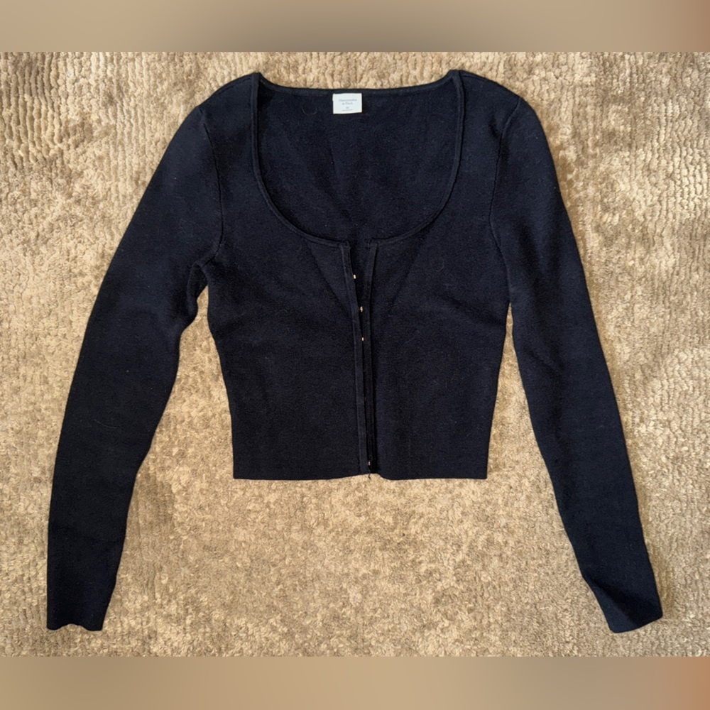 Black cardigan with clasp front